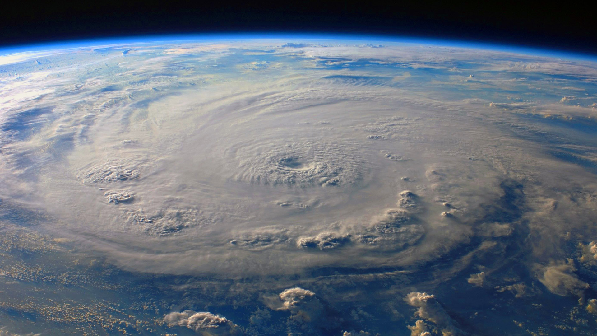 A view of the earth from space shows a large storm.