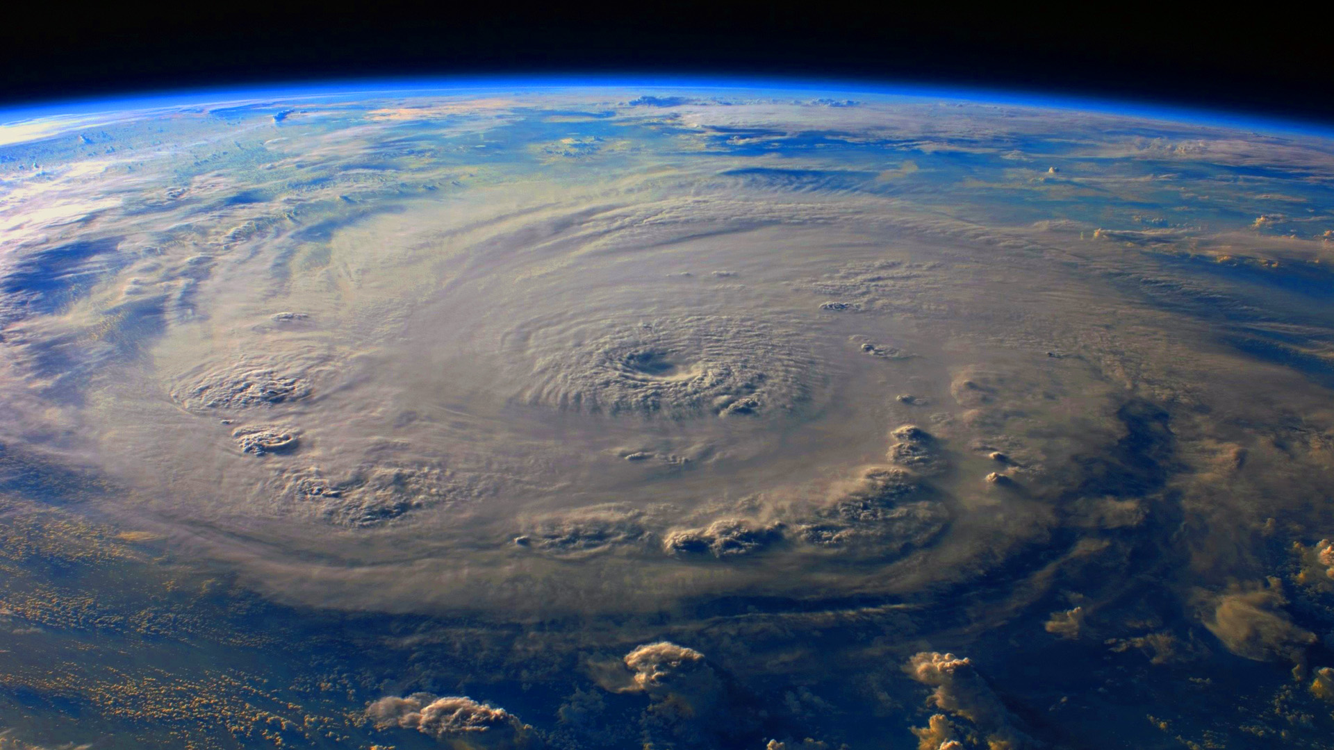 A view of the earth from space shows a large storm.